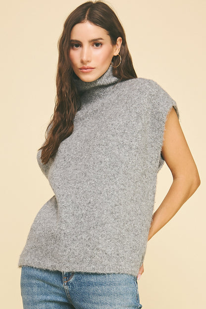 The Woven Grace Turtle Neck Cap Sleeve Sweater